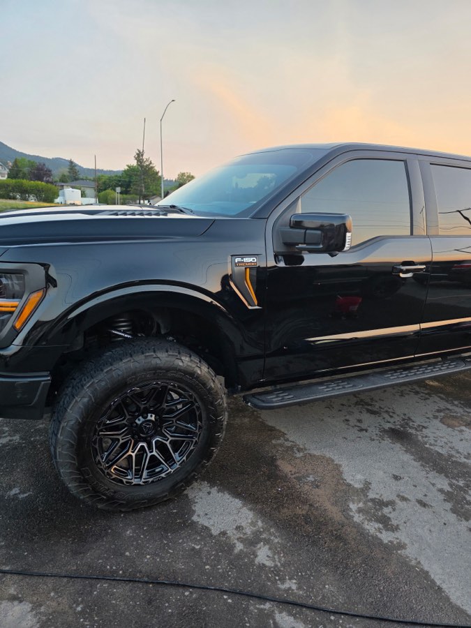 Black F-150 after a wash and exterior detail at dusk