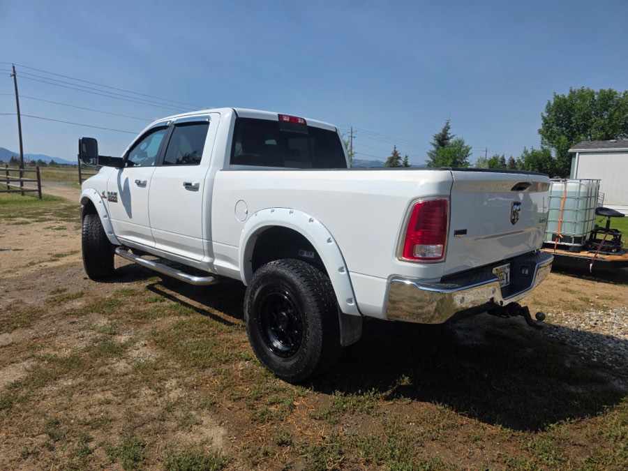 Rear of a white Ram dually after detailing