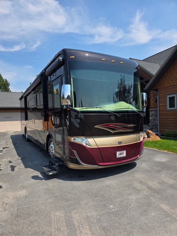 Front of a detailed motorhome with clean glass and trim